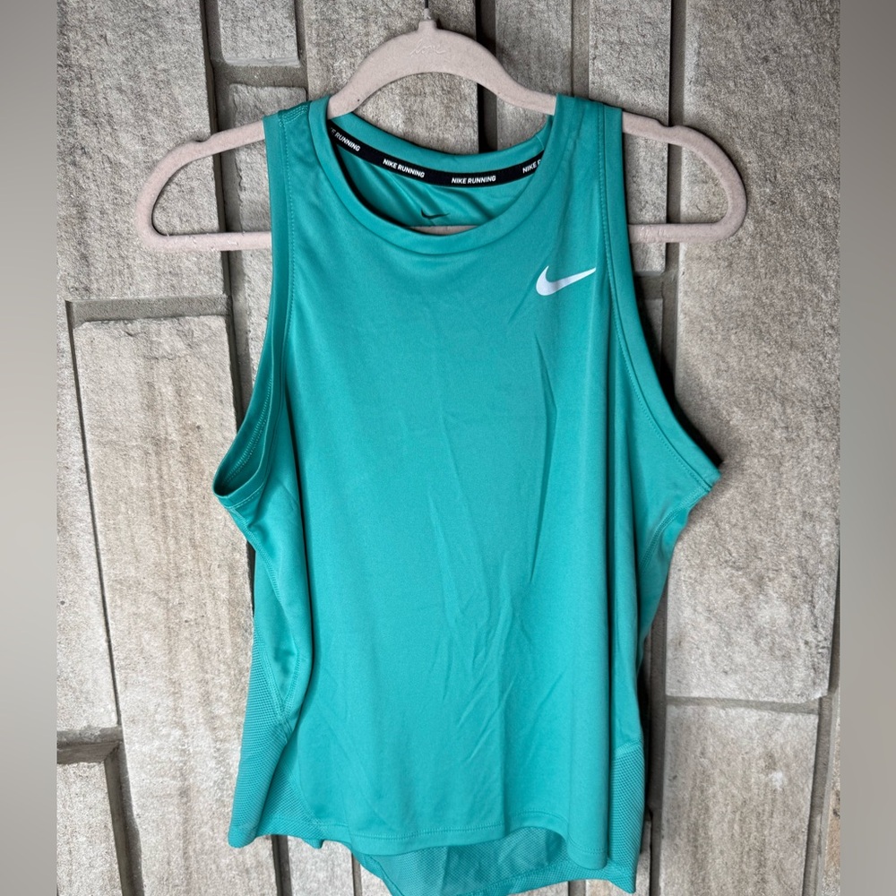 Nike Dri-fit, teal/turquoise workout tank. Size Medium, barely worn.